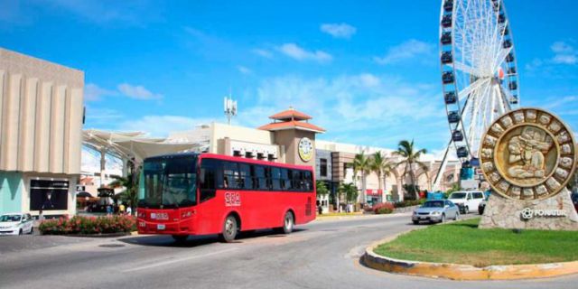 Red bus for public transportation in Cancún