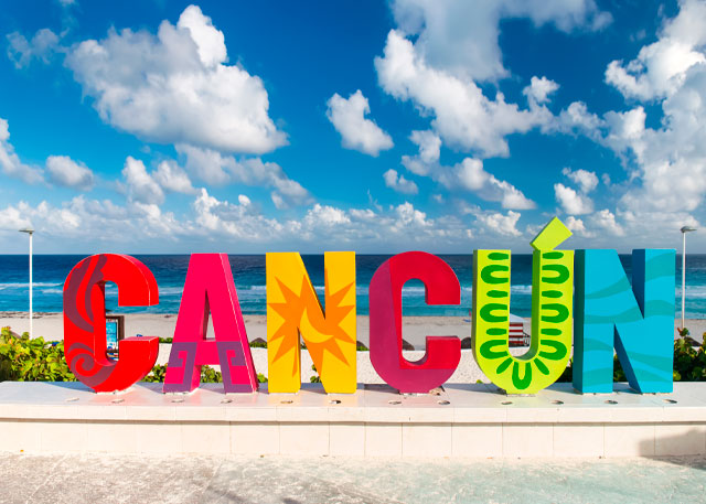 cancun giant letter at the beach